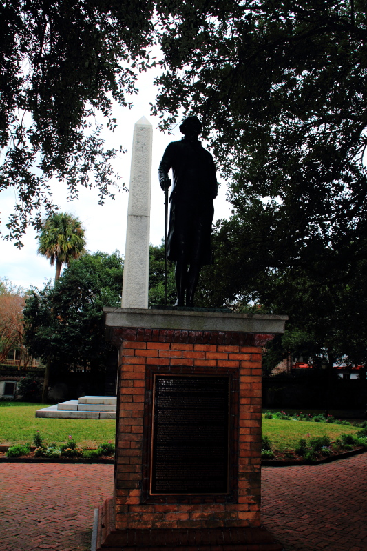 Confederate obelisk behind statute of George Washington. Meeting Place, Charleston Historic District