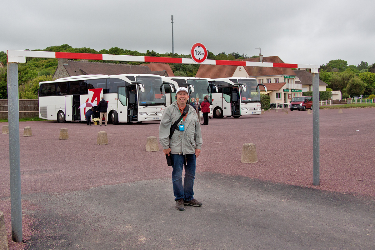 Greg with our tour buses in the background
