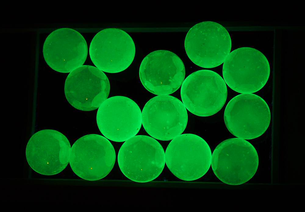 uranium glass marbles fluoresce under long wave UV light