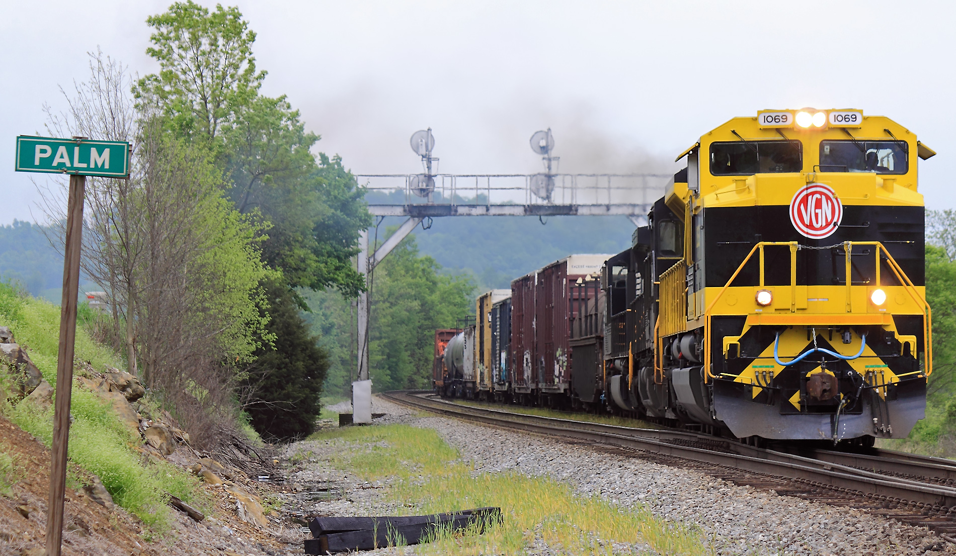 After meeting a pair of Southbound intermodals, Virginian 1069 gets train 142 back on the move at Palm 