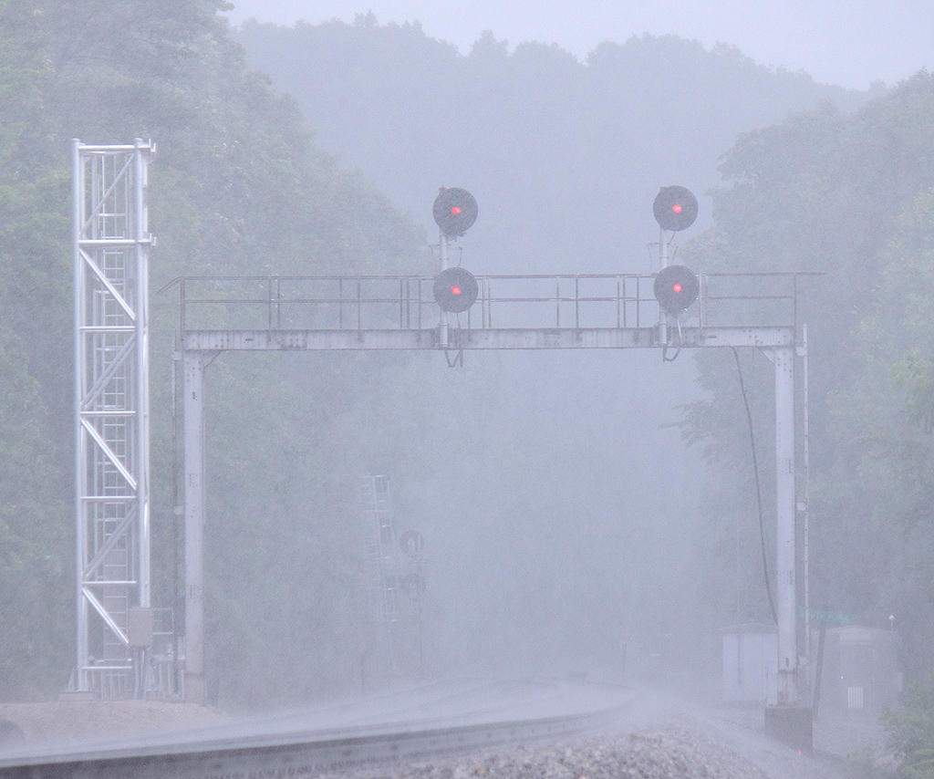 The old GRS searchlight signals stand guard in a monsoon at Southfork 