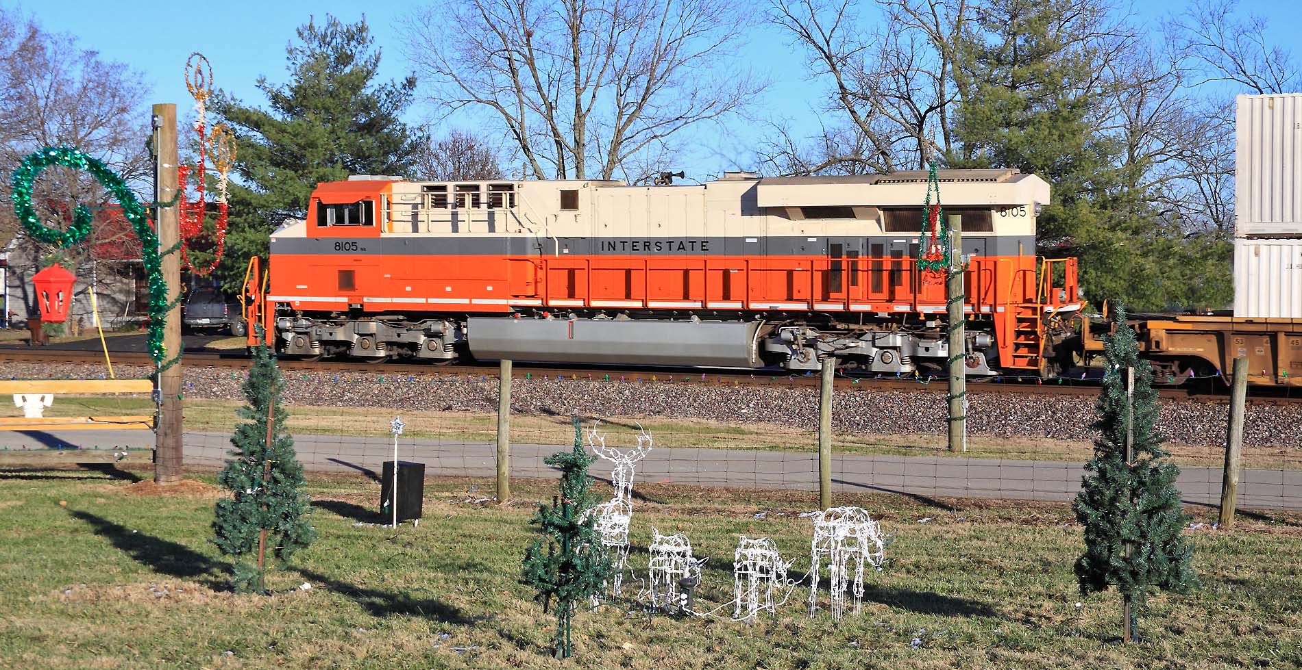 Interstate 8105 trails NS 23G through Salvisa, passing the massive Christmas display at the James Farm 