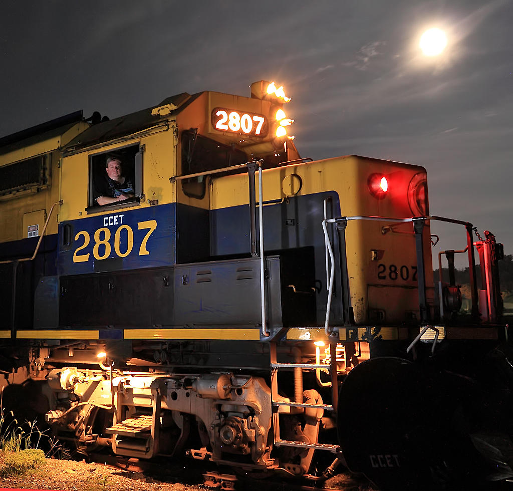 CCET 2807  idels under a full moon on the former N&W mainline near Batavia, Ohio 
