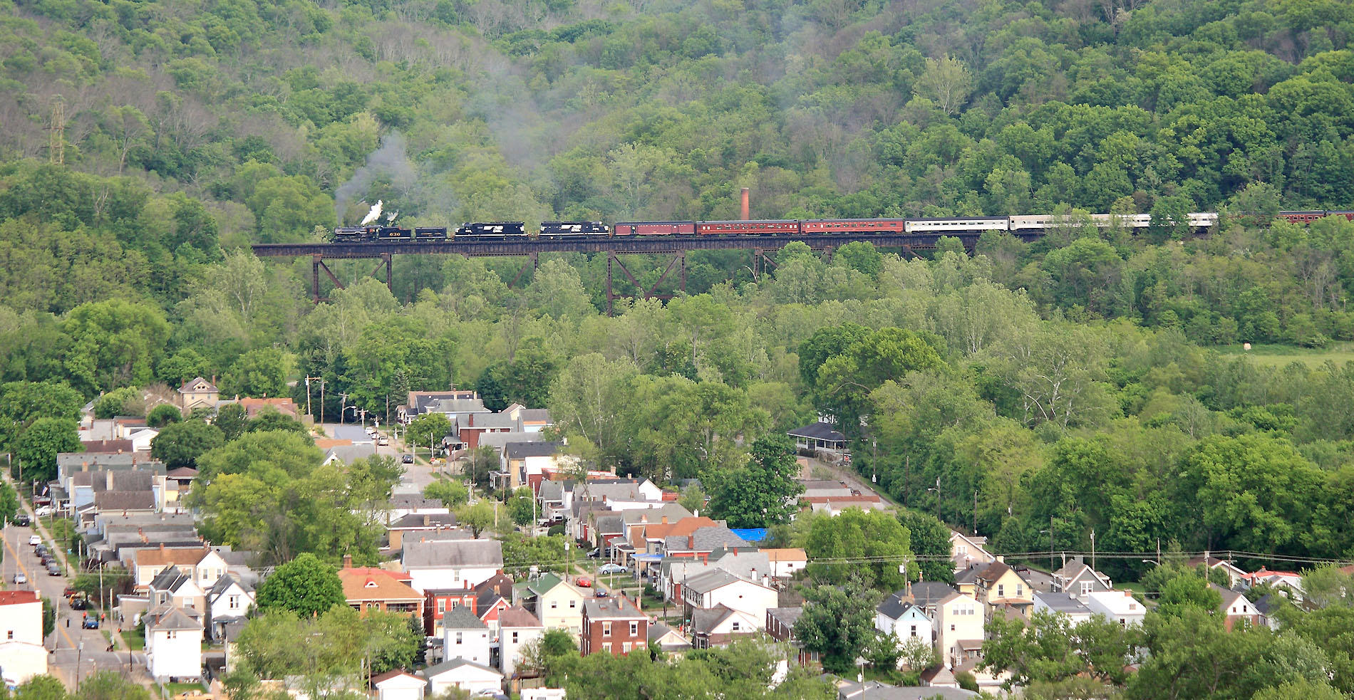 Southern 630 soars high above Ludlow KY as the train returns North after a trip to Danville 