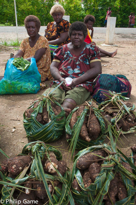Vendors with sweet potato at the Kavieng Market