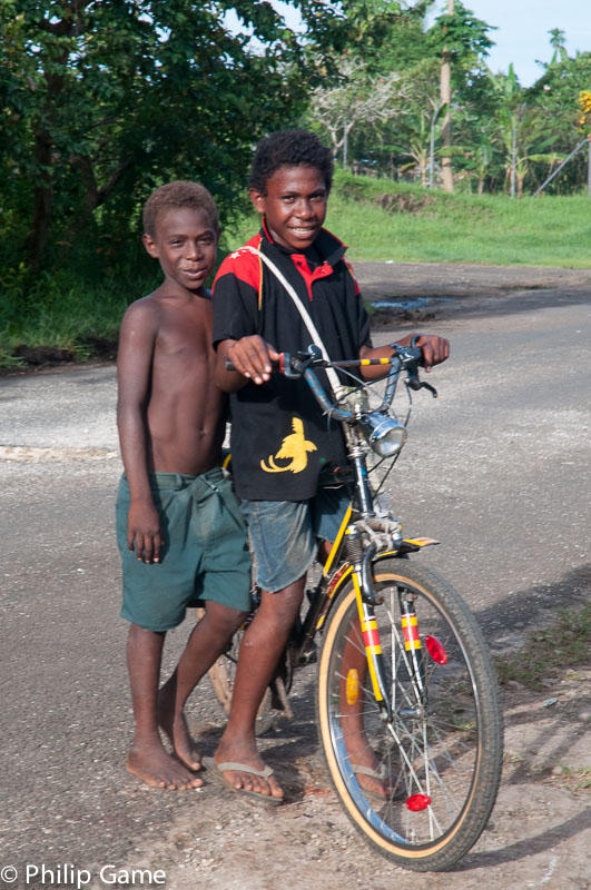 Boys on a bike on a lazy Sunday afternoon