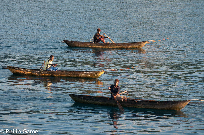 MAKIRA ISLAND.  Villagers of Anuta paddle out to make contact