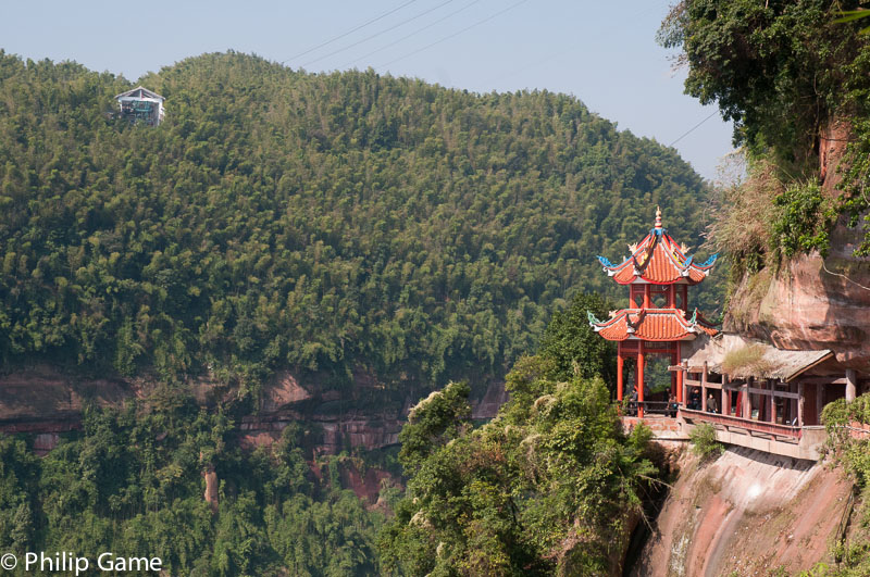 Diaxiagu cable car crosses a forested gorge