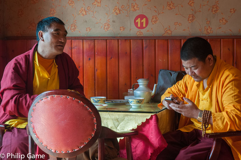 Monks lunching in the Tibetan district of Chengdu