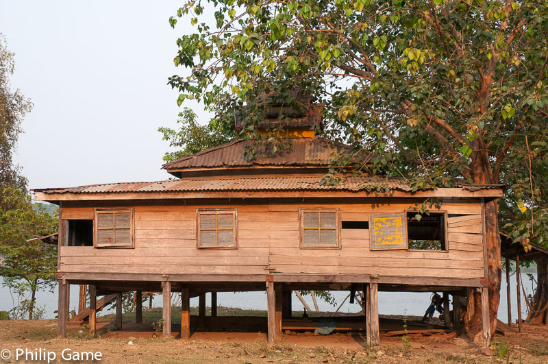 Village building above the river