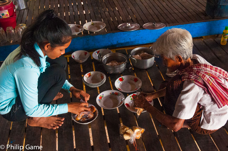 Preparing food for the monks at a Wat on Koh Trong