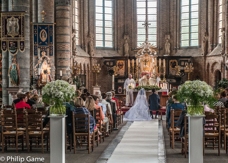 A wedding in progress in the ancient Catholic church