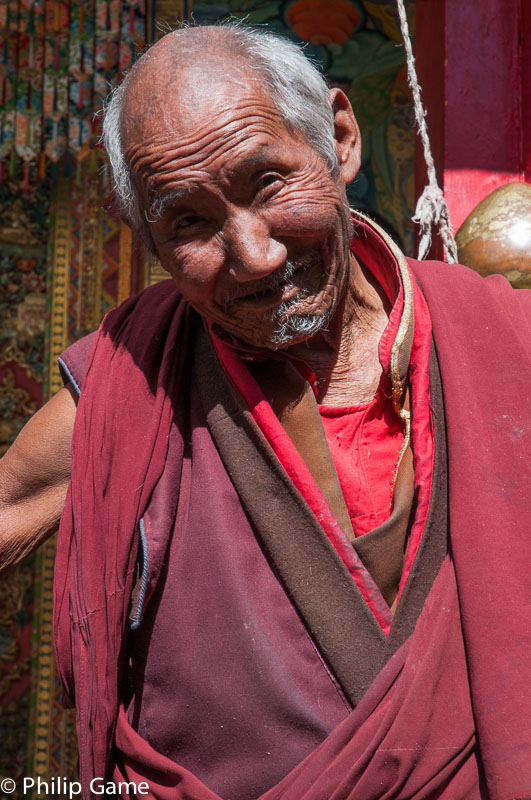 Genial monk at Tashilhumpo, Shigatse, Tibet