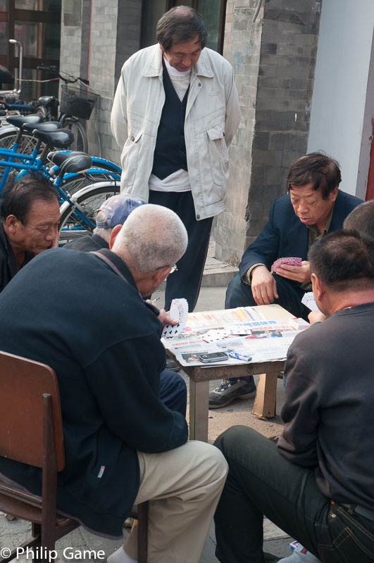 Elders at play in a 'hutong' (back street lane)