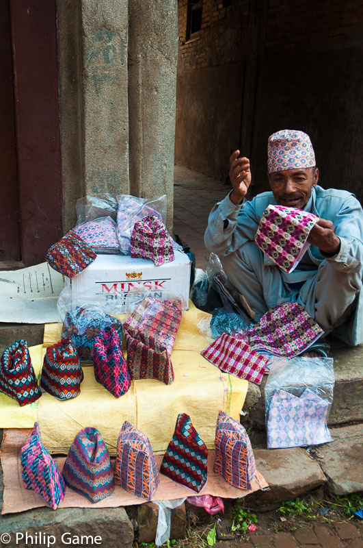 Vendor of Newari men's caps