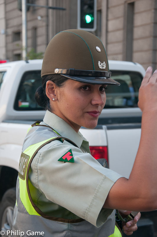 Carabinera (policewoman) directing traffic, Chile