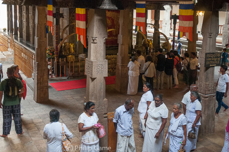 Worshippers inside the Temple of the Tooth, Kandy