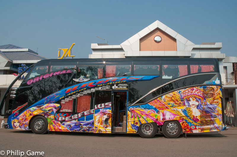 Thailand: Luridly-painted tour coach