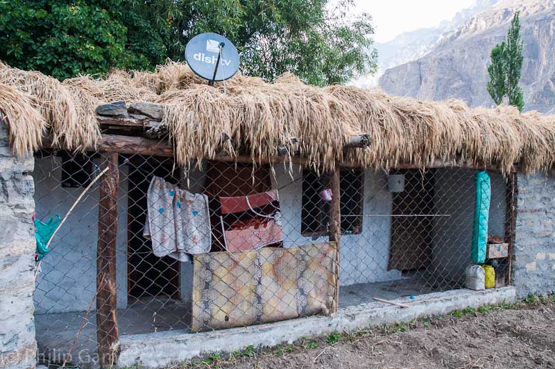 Village home with satellite dish