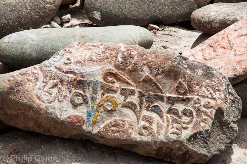 Prayers inscribed on boulders, Shey Palace