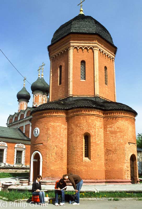 Art students sketching at Vysoky Petrovsky Monastery