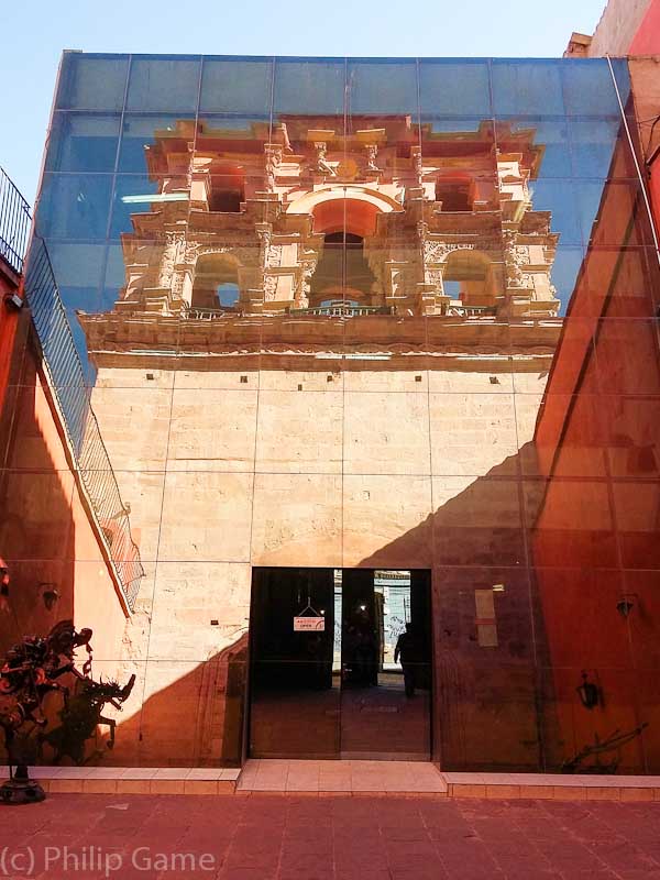 Tower of the Company of Jesus, reflected