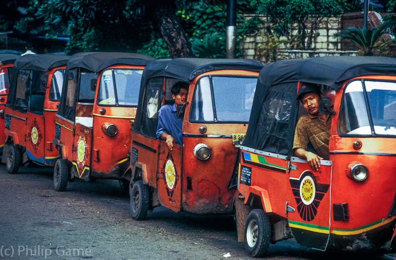 Indonesia: Bajaj or three-wheeler cabs waiting at Blok M, South Jakarta