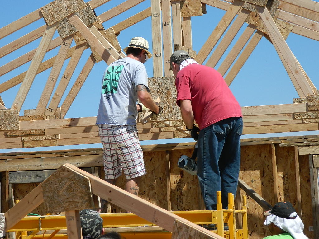 Doug and Chris raising the trusses