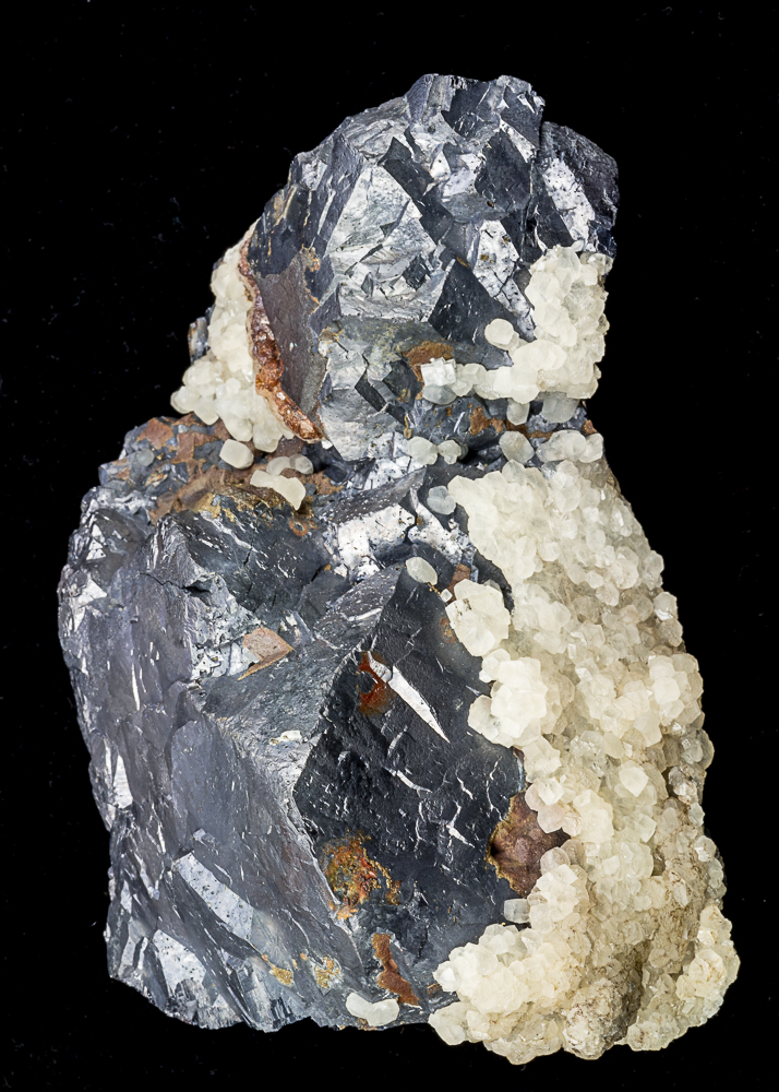 Galena, 11 cm tall with cuboctahedra to 6 cm and calcite crystals. Maisy Mouse Pocket, Rampgill Mine, Alston Moor, Cumbria.