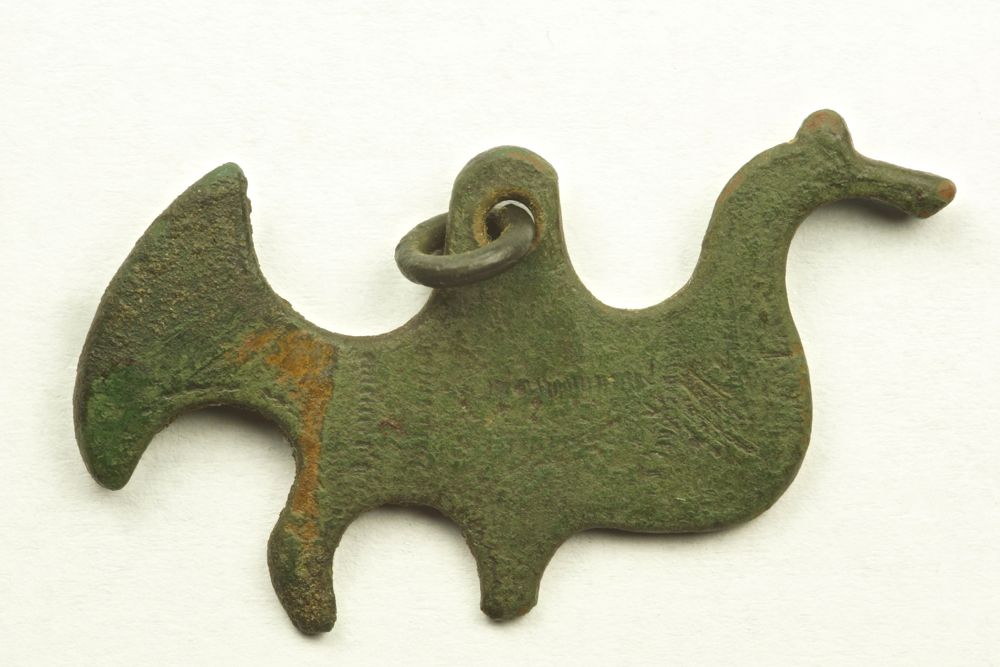 Viking Age zoomorphic pendant, 42 mm, with fine chased detail, Baltic. Probably a bird.