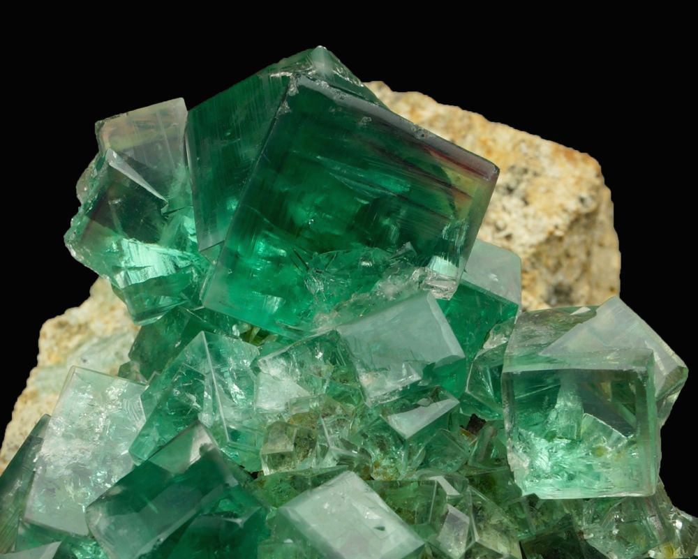 Transparent green fluorite crystals to 22 mm on edge in 10 cm group. Middlehope Shields Mine, Westgate, Weardale, County Durham.