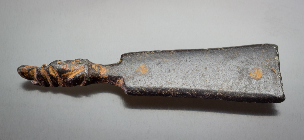 Strap end (Thomas 2000 Class I), 11th century, 37 mm with beast head.