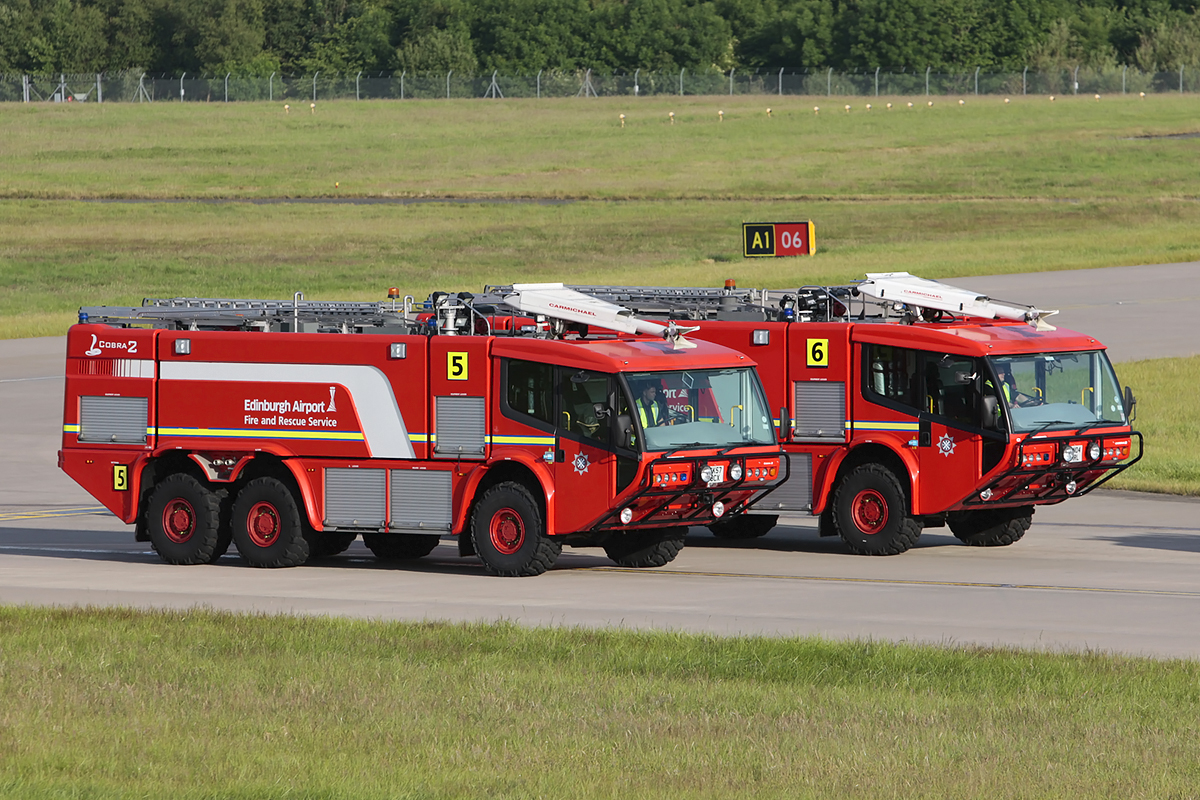 Fire 5 and Fire 6, a pair of Carmichael Cobra II Crash Tenders at Edinburgh Airport.