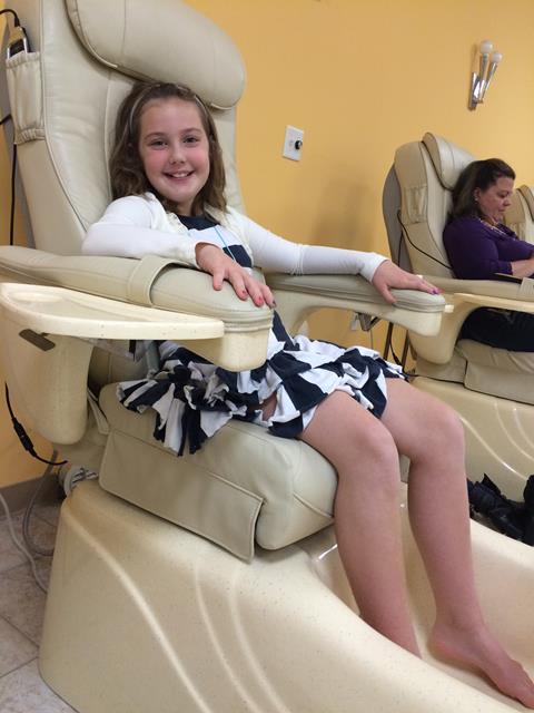 getting her mani pedi on