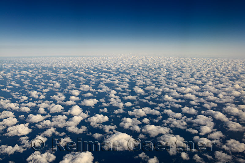 Aerial view of popcorn cumulus clouds over Lake Michigan