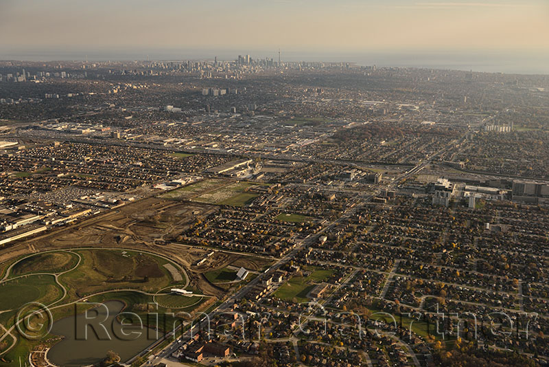 Downsview Park in North York with Toronto city skyline of highrise towers on Lake Ontario