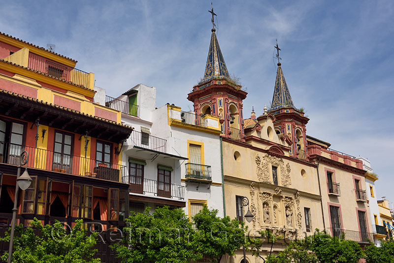 Twin bell towers on church at hospital San Juan de Dios on plaza del salvador Seville Spain