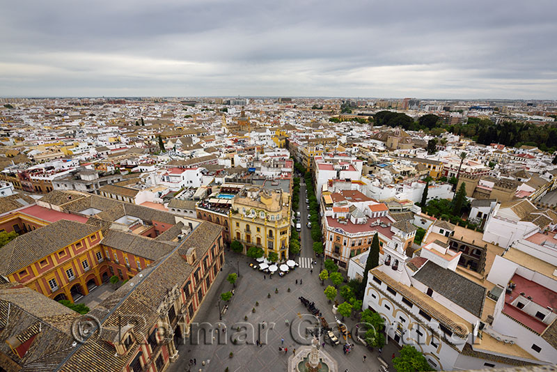 View east with Archbishops palace at Plaza Virgen de los Reyes from Seville Cathedral Giralda