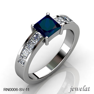Blue Sapphire Gemstone Ring With 0.75 Carats Of Diamonds.