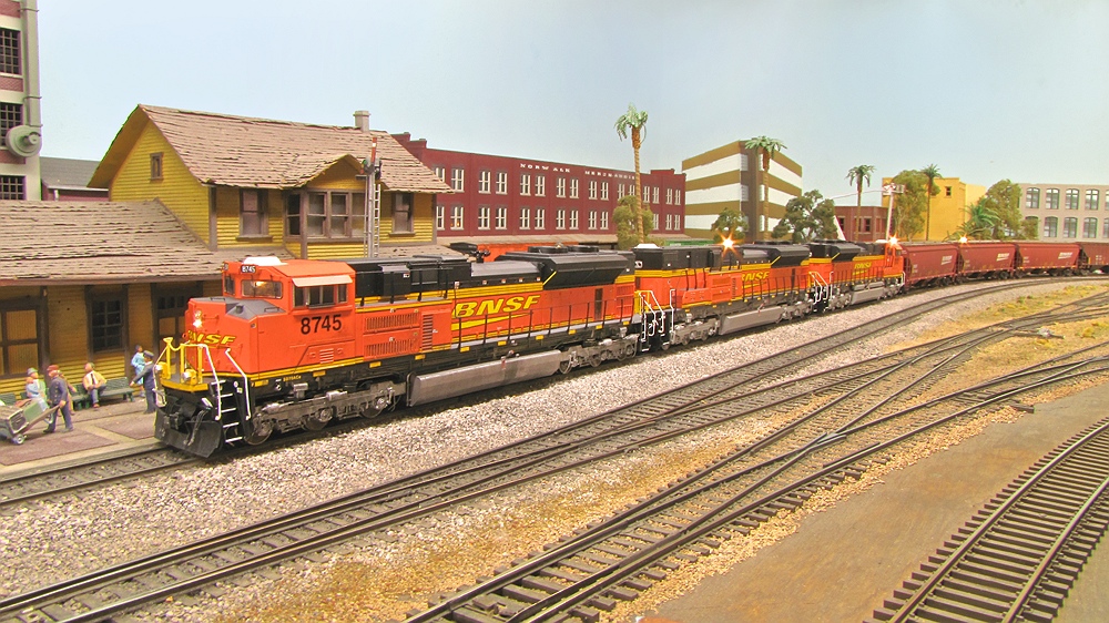 A soon to be numbered (BNSF 8500) fantasy B-unit SD70ACe is part of the consist.