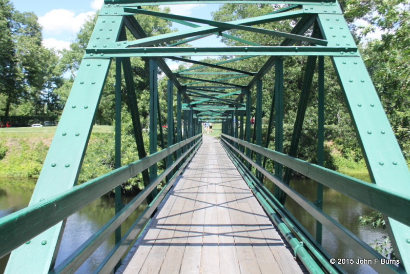 The golfers foot bridge across the river
