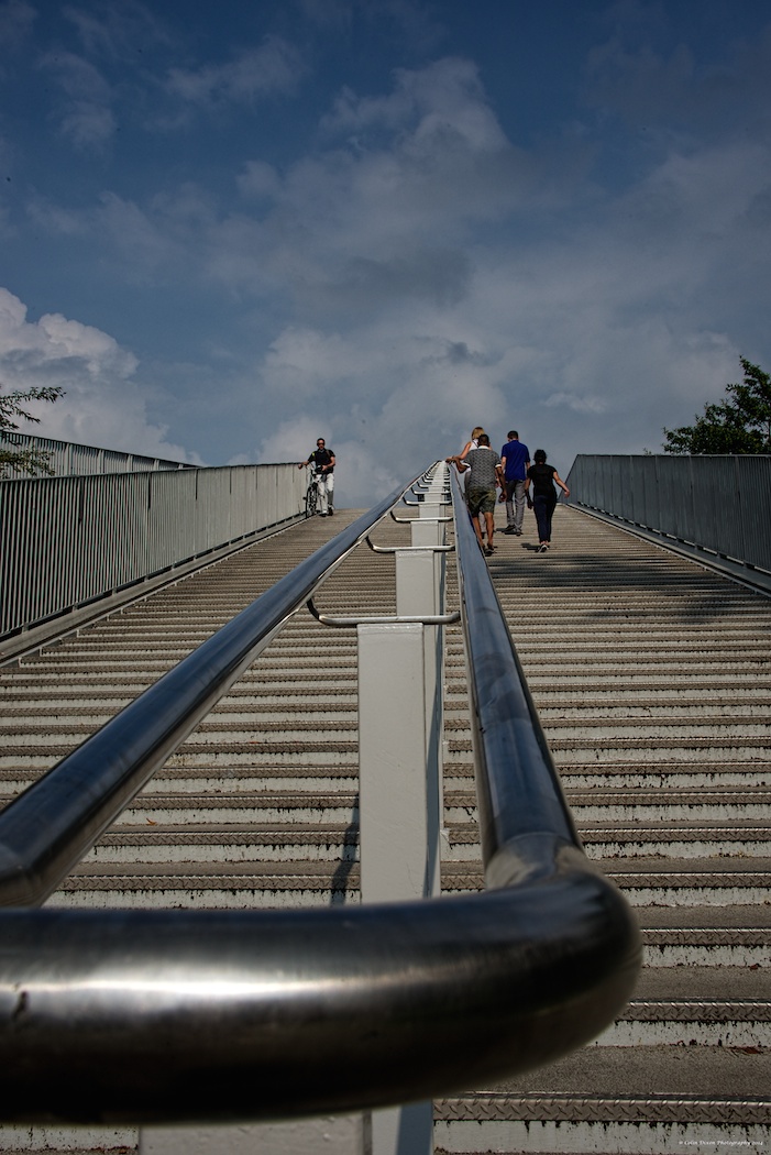Up the stairs.