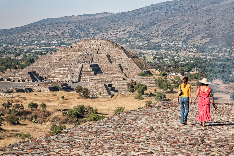 Two women walking on Pyramid of the Sun