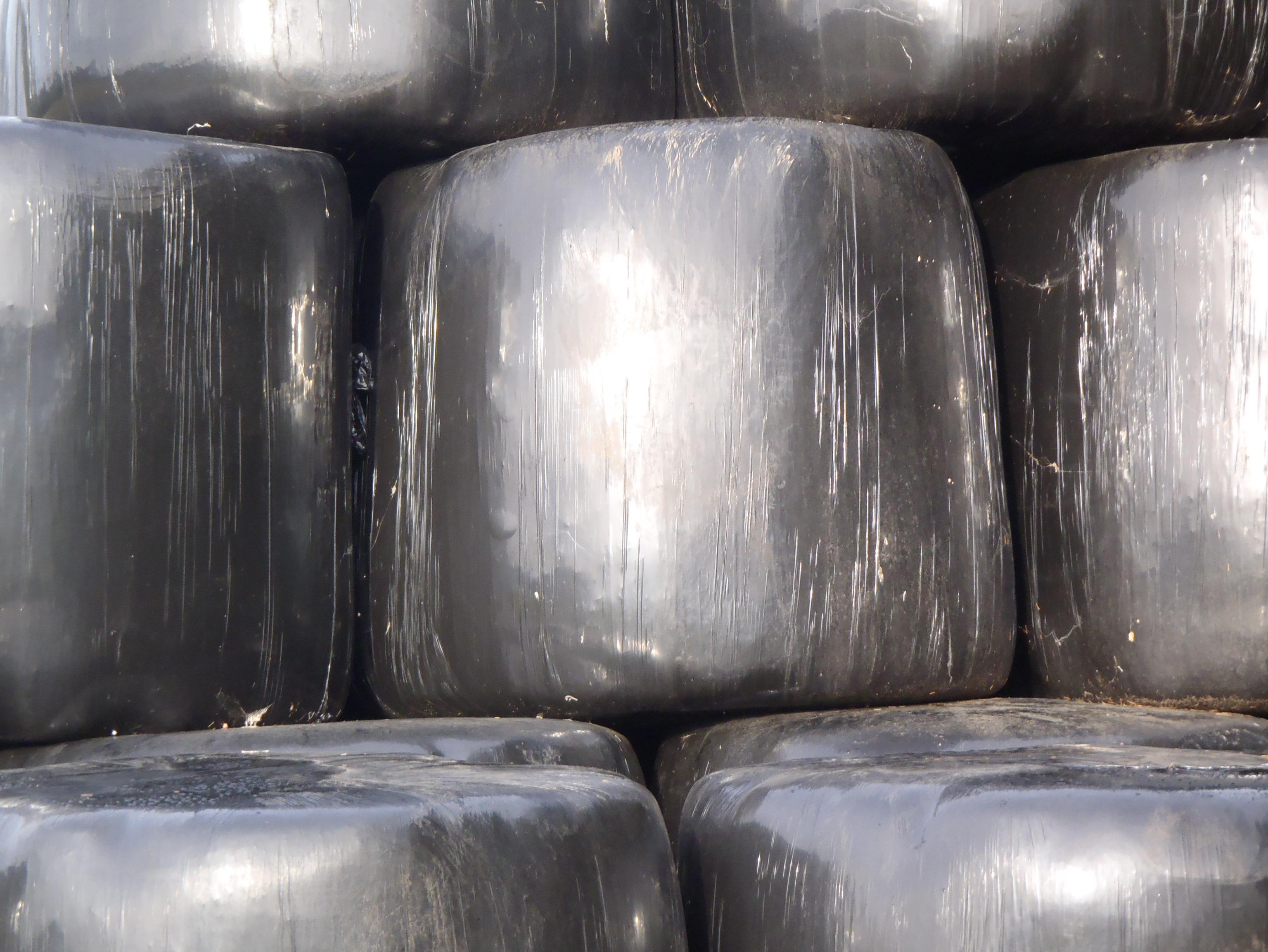 Plastic coated hay bales