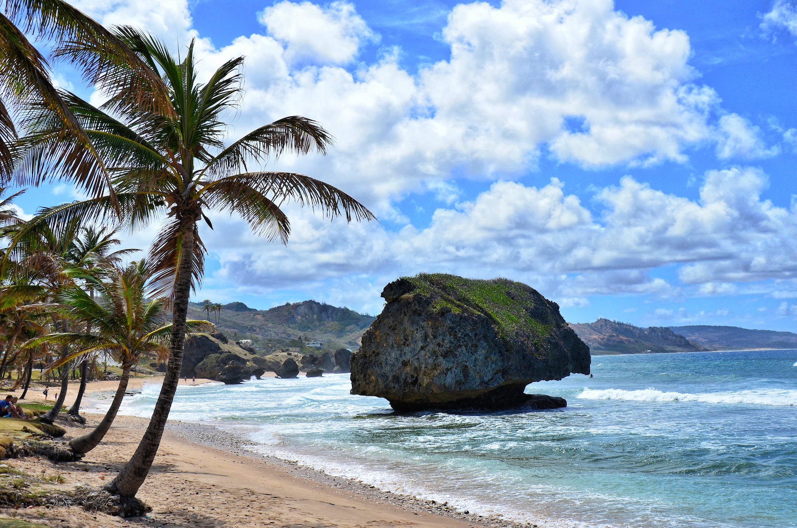 Large rocks line the beach at Bathsheeba