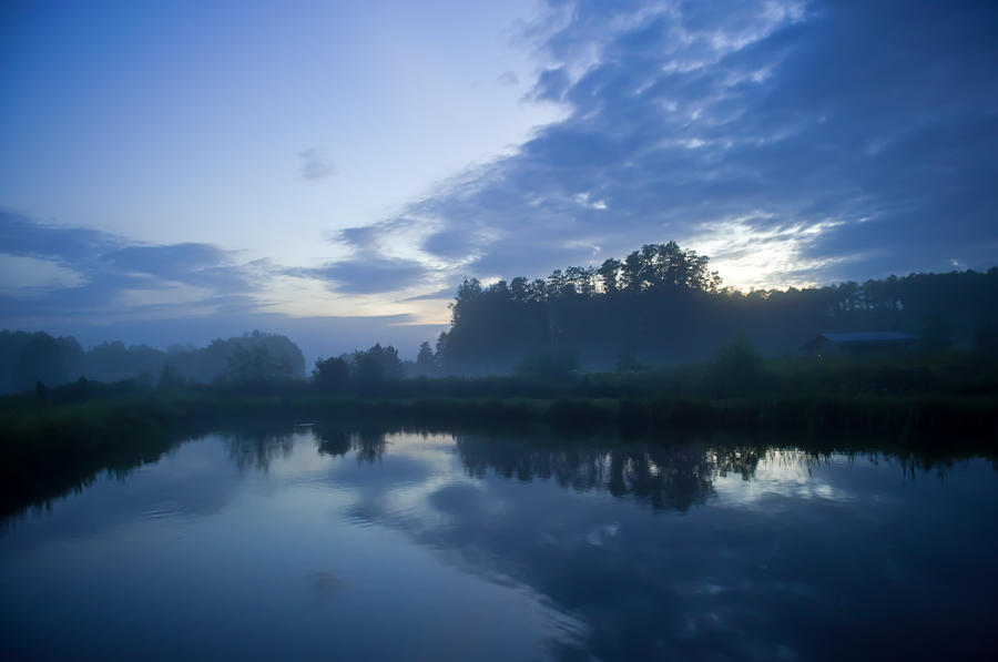 Water Meets The Sky In Misty Twilight