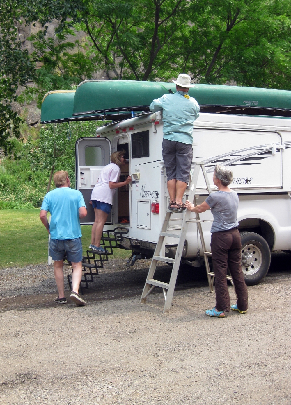 Loading the Canoes on Evans Camper