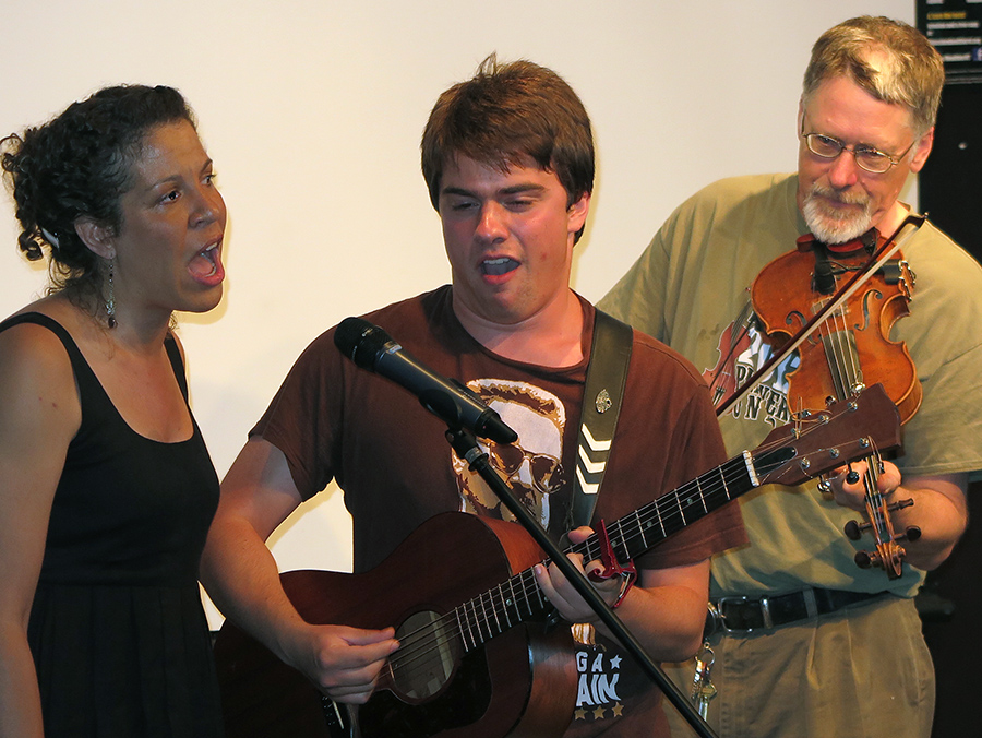 Amber, Dan, and Son Wylie Performing