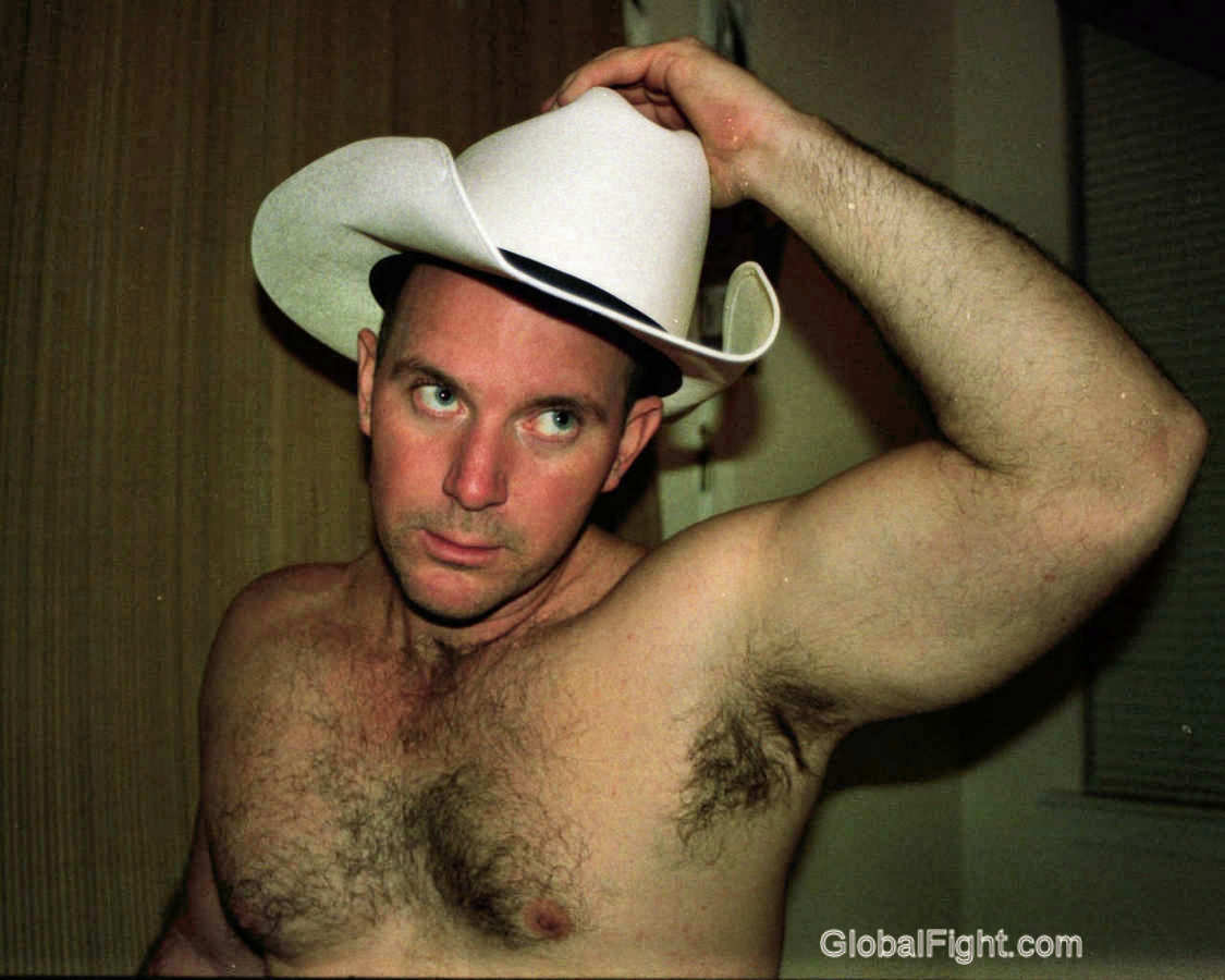 0cowboy removing hat.jpg