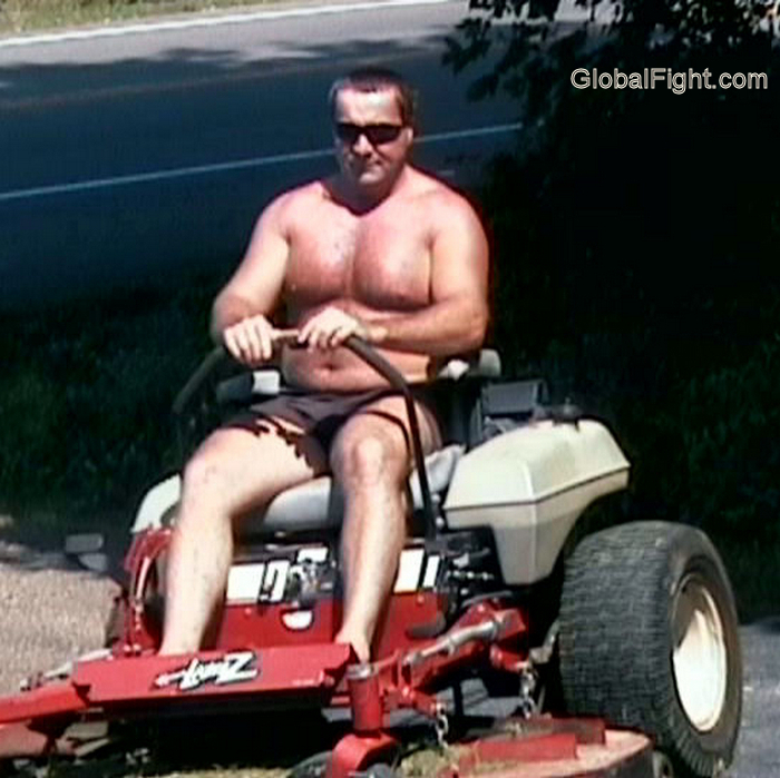 no shirt man mowing.jpg